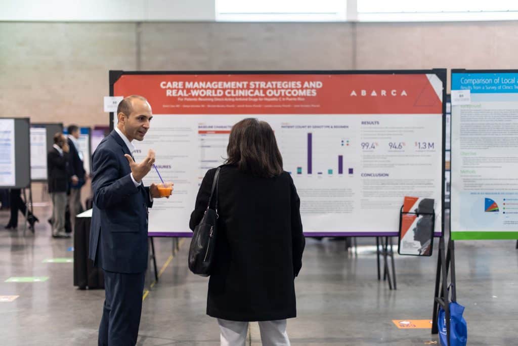 David Capo presents his poster at the AMCP Annual Conference, detailing a care management plan Abarca implemented to help patients with Hepatitis C.